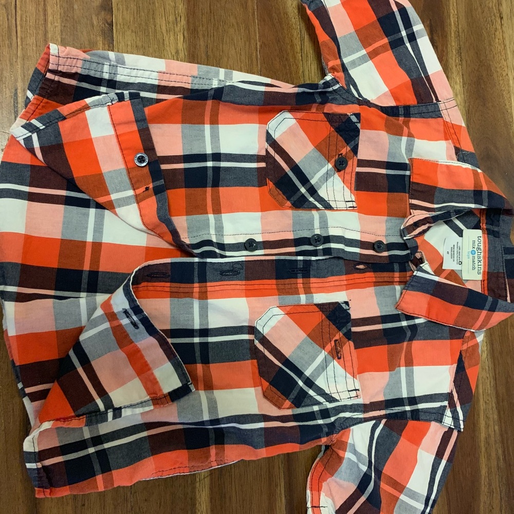 Tough skin striped little boys button down shirt.